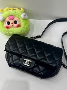CHANEL Black Quilted Lambskin Crossbody Bag with Silver-Tone CC